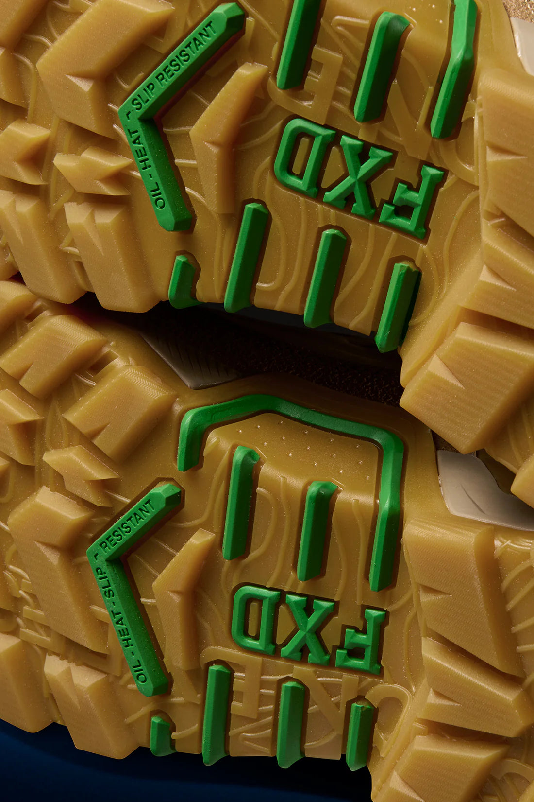 Close-up of a textured surface with green FXD branding