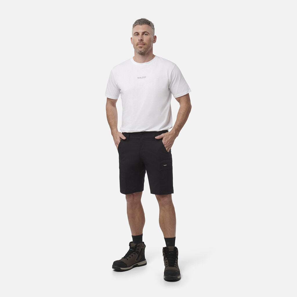 Man wearing a white t-shirt and black shorts on a white background